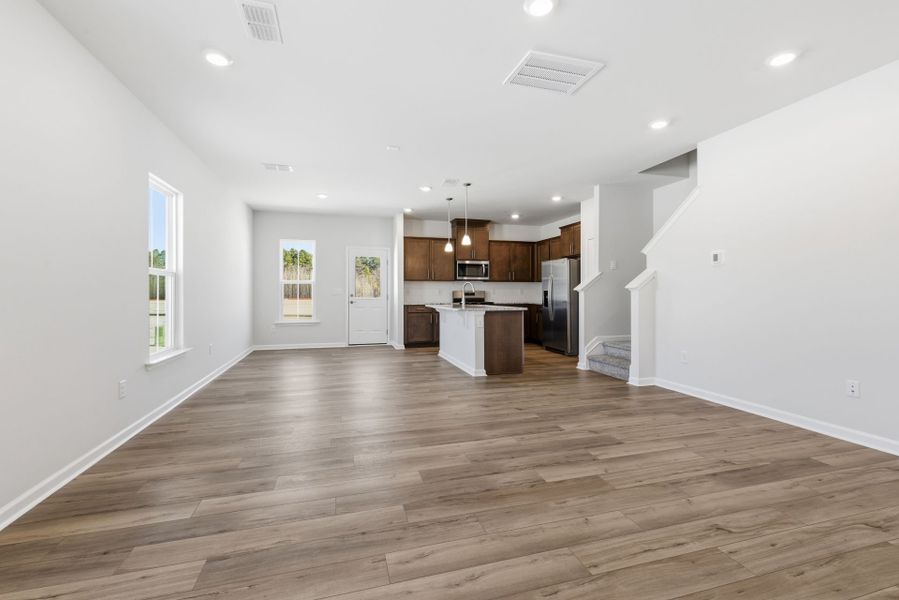 Spacious, unfurnished interior of a new home in Poets Walk, Whitsett (Image 51).