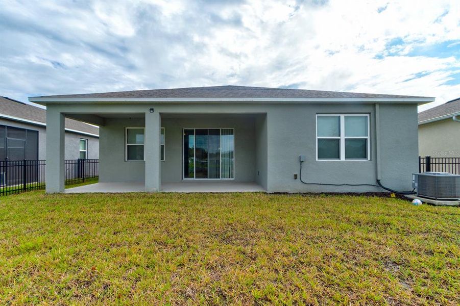 Front exterior of a new home in , New Smyrna Beach, FL, highlighting curb appeal (Image 2).