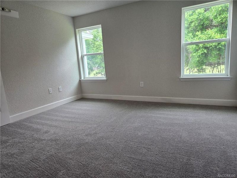 Spacious, unfurnished interior of a new home in Wyld Palms, Inverness (Image 11).