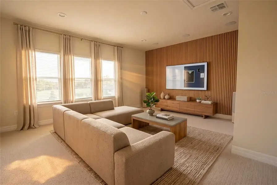 Furnished interior view inside a new home in Parkview Reserve, Orlando (Image 8).