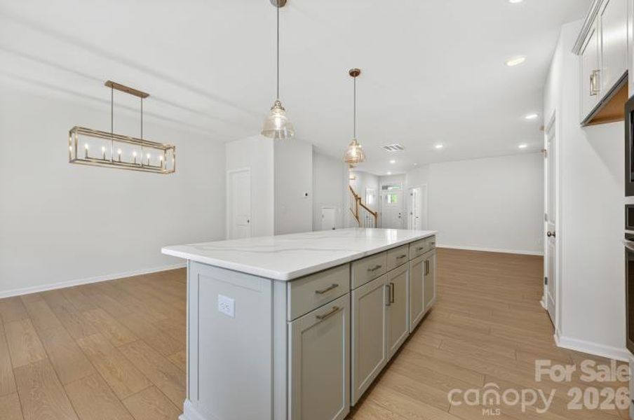 Furnished interior view inside a new home in North Creek Village - Townhomes, Huntersville (Image 5).