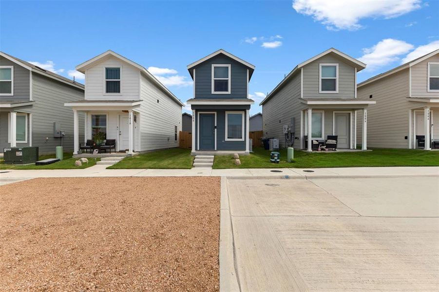 Front exterior of a new home in Tillage Farms, Princeton, TX, highlighting curb appeal (Image 2). Front exterior of a new home in Tillage Farms, Princeton, TX, highlighting curb appeal (Image 2).