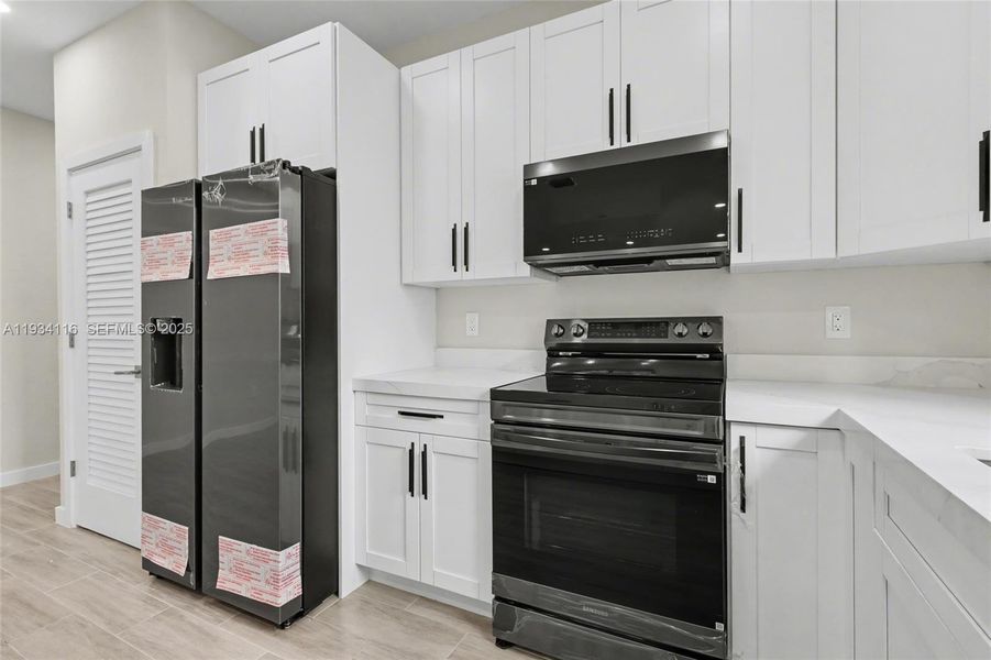 Furnished interior view inside a new home in , Dania Beach (Image 8). Furnished interior view inside a new home in , Dania Beach (Image 8).