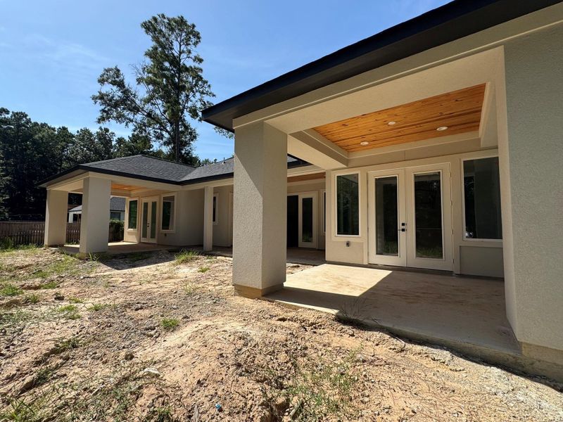 Exterior details and patio area of a home in , Splendora (Image 3).