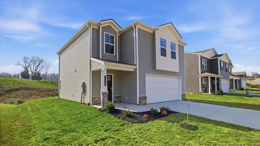Front exterior of a new home in Emory Creek, Harriman, TN, highlighting curb appeal (Image 2).