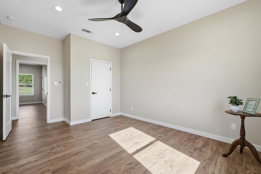 Bedroom 2 is nice sized with a walk in closet