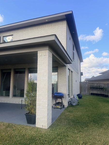 Exterior details and patio area of a home in Marvida 55' - Gated, Cypress (Image 4). Exterior details and patio area of a home in Marvida 55' - Gated, Cypress (Image 4).