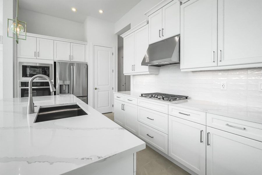 Furnished interior view inside a new home in Rivella, Port St. Lucie (Image 7).