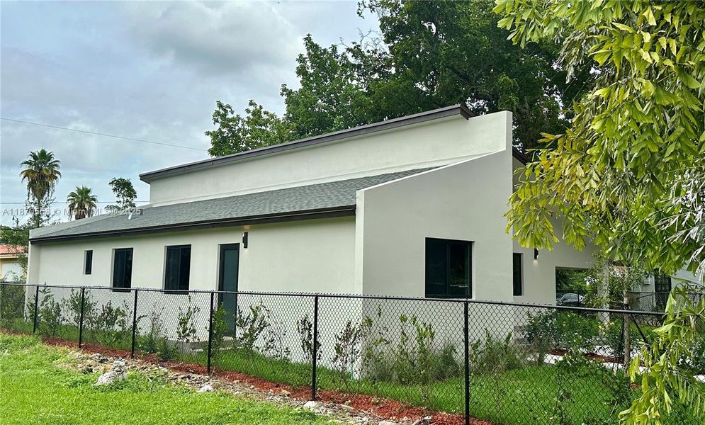 Front exterior of a new home in , Miami, FL, highlighting curb appeal (Image 2).
