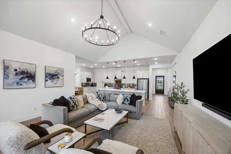 Sightlines stretch from the front entry through the kitchen, enhancing flow and connection across the home. Sightlines stretch from the front entry through the kitchen, enhancing flow and connection across the home.