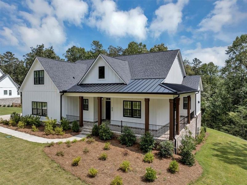 Front exterior of a new home in , Ball Ground, GA, highlighting curb appeal (Image 22).