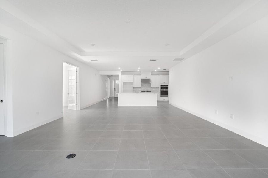 Spacious, unfurnished interior of a new home in Harvest at Ovation, Winter Garden (Image 23).