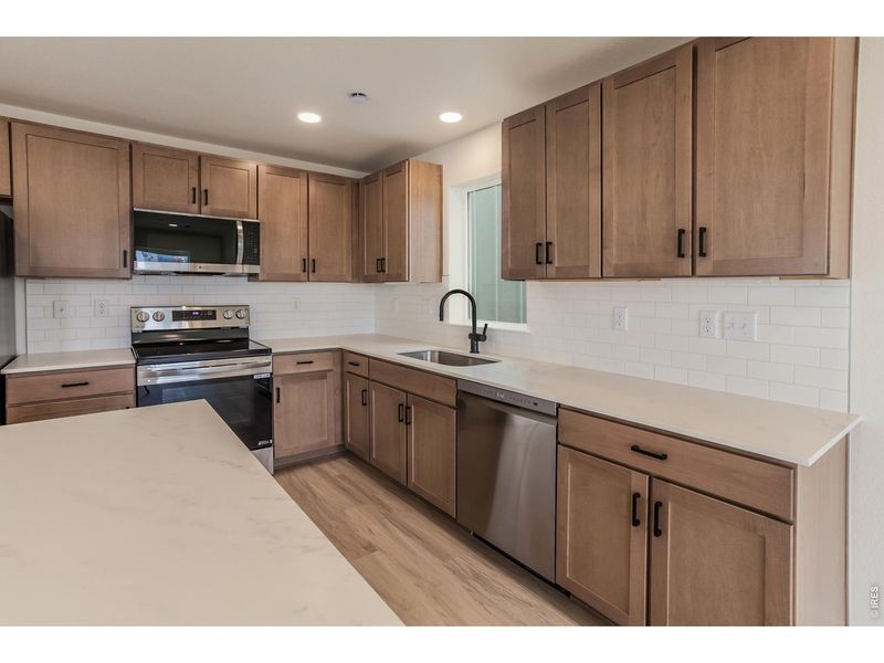 Furnished interior view inside a new home in Bloom Trailblazer Collection - Single Family Homes, Fort Collins (Image 8).