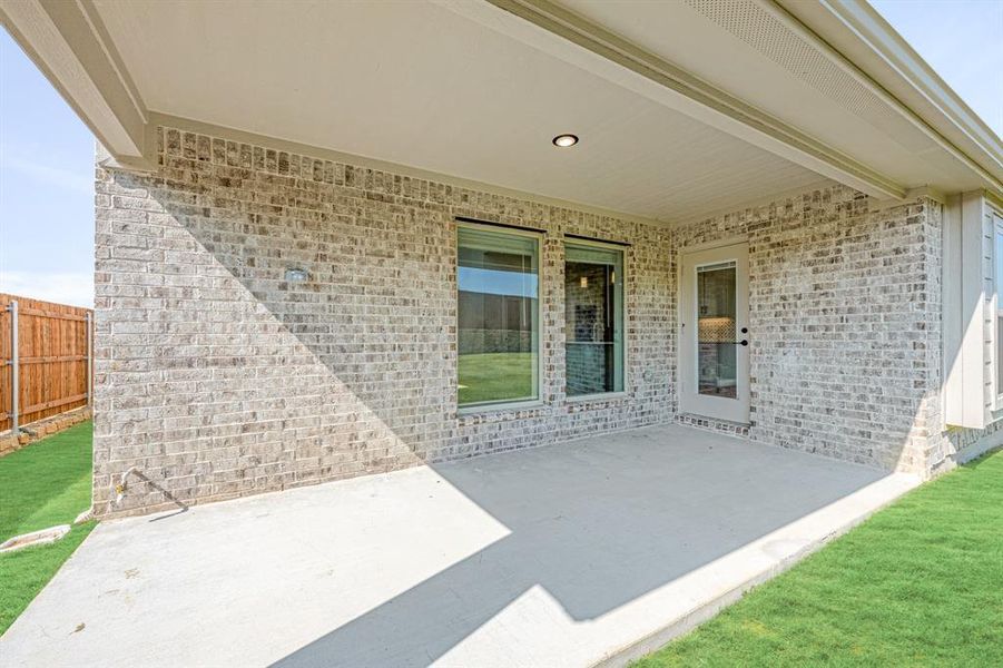 Front exterior of a new home in Parks at Panchasarp Farms 65, Burleson, TX, highlighting curb appeal (Image 24). Front exterior of a new home in Parks at Panchasarp Farms 65, Burleson, TX, highlighting curb appeal (Image 24).