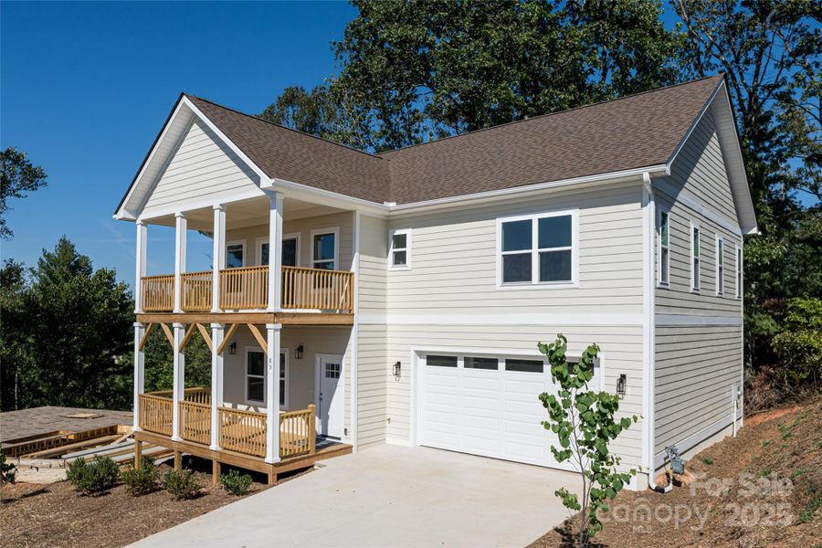 Front exterior of a new home in , Asheville, NC, highlighting curb appeal (Image 1). Front exterior of a new home in , Asheville, NC, highlighting curb appeal (Image 1).
