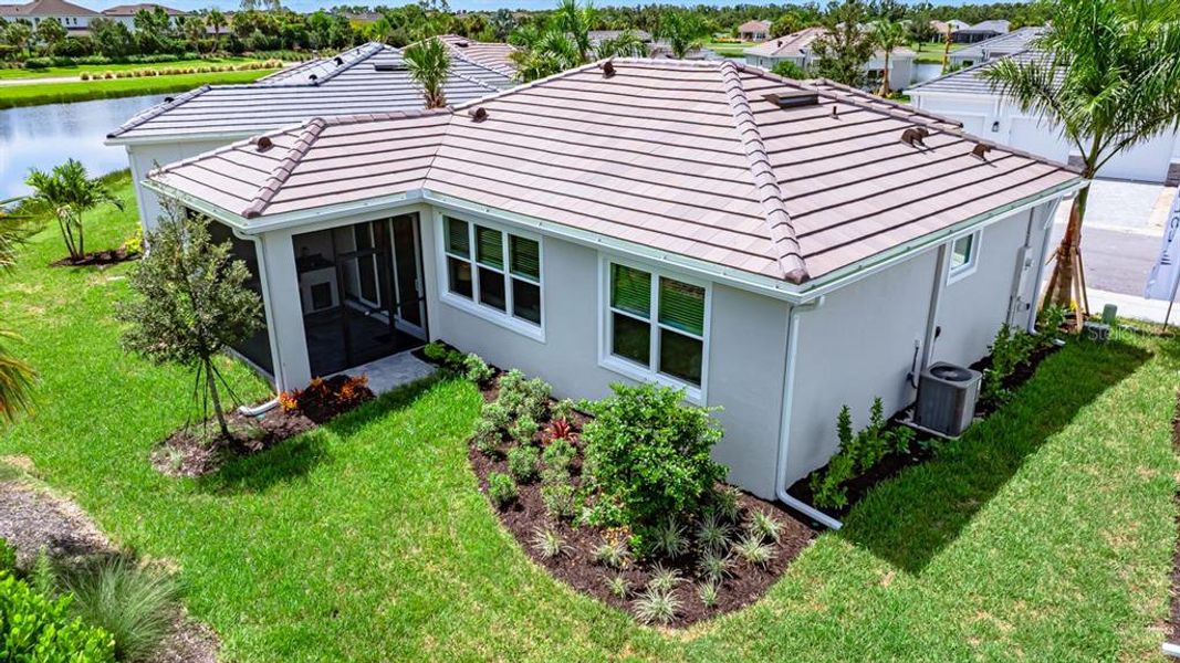Exterior details and patio area of a home in Esplanade at Azario Lakewood Ranch, Lakewood Ranch (Image 26).