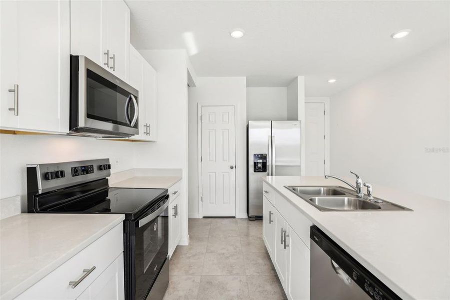 Furnished interior view inside a new home in Lake Deer Estates - Classic Series, Poinciana (Image 9).