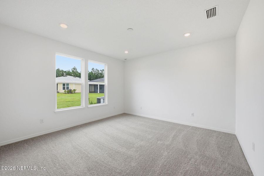 Spacious, unfurnished interior of a new home in Del Webb Wildlight, Yulee (Image 17).