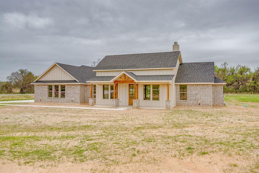 Exterior details and patio area of a home in , Poolville (Image 27).