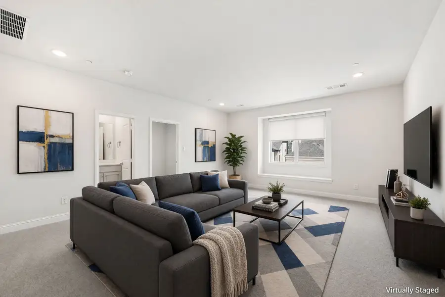 Furnished interior view inside a new home in Cottonwood Creek, Rowlett (Image 17).