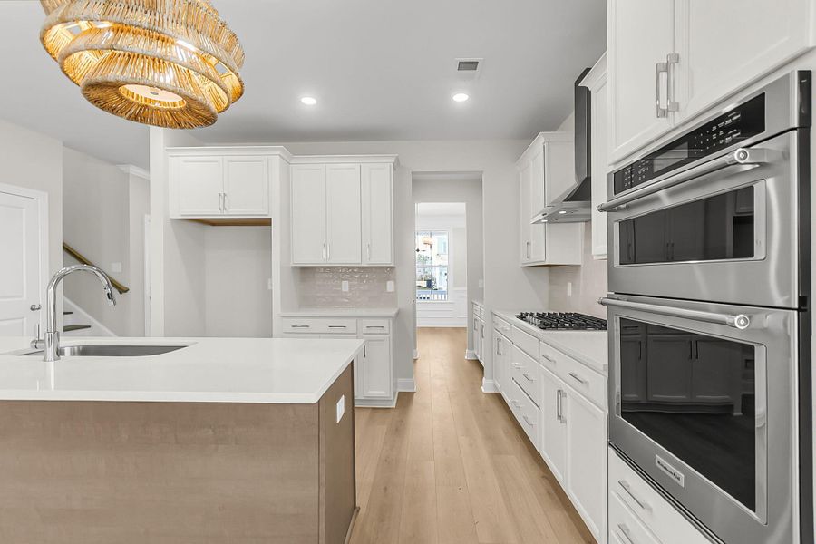 Furnished interior view inside a new home in Tidewater at Lakes of Cane Bay, Summerville (Image 10).