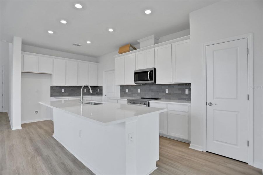 Furnished interior view inside a new home in Seaire, Parrish (Image 8).