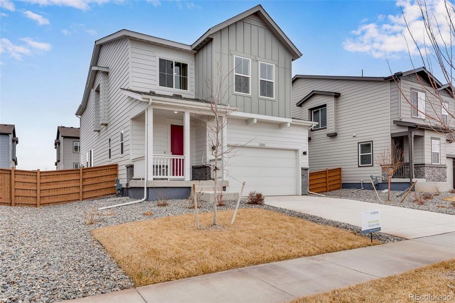 Exterior details and patio area of a home in Reunion, Commerce City (Image 27).