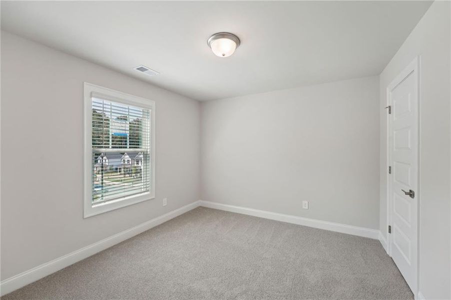 Spacious, unfurnished interior of a new home in Hemingway - Reserve Series, Cumming (Image 32).