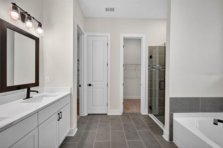 Furnished interior view inside a new home in Stables at Cary Forest, Bryceville (Image 14).