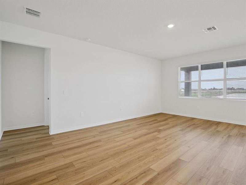 Spacious, unfurnished interior of a new home in Coasterra - Reserve Series, Palmetto (Image 9).