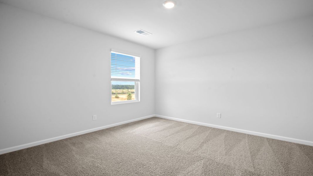 Spacious, unfurnished interior of a new home in The Groves at Bees Creek, Ridgeland (Image 36).