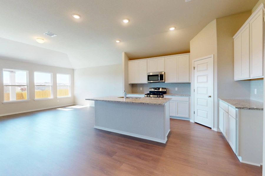 Furnished interior view inside a new home in Carillon, Manor (Image 5).