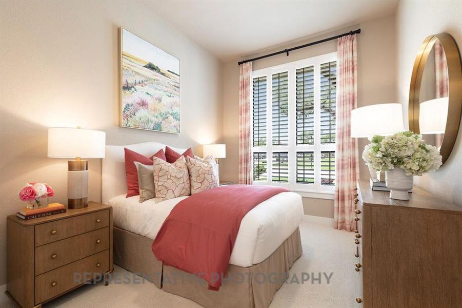 Bedroom with carpet and baseboards Bedroom with carpet and baseboards