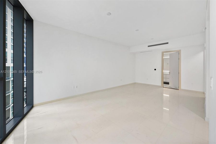 Spacious, unfurnished interior of a new home in Aston Martin Residences, Miami (Image 16).
