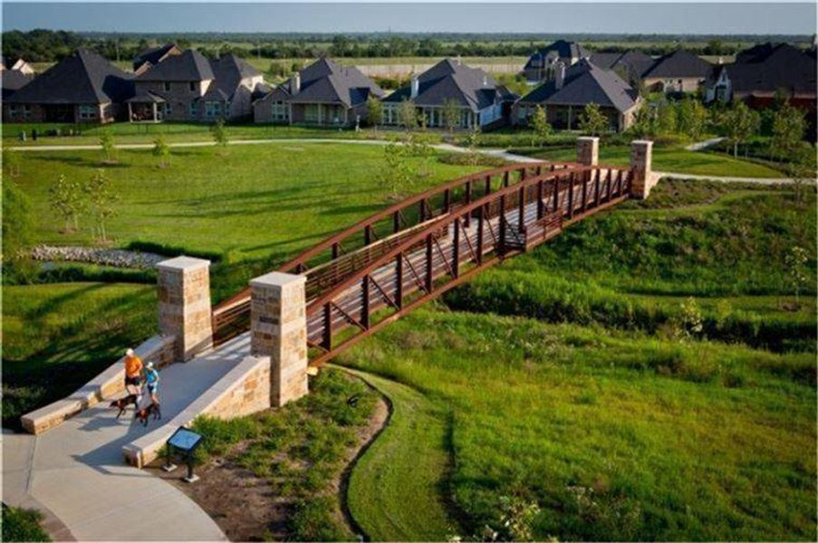 A signature landmark of Cross Creek Ranch—the scenic bridge at Flewellen Creek connects miles of walking trails and expansive green space. Framed by lush landscaping and serene views, it’s the perfect place for morning jogs, evening strolls, or simply soaking in the natural beauty of the community. A signature landmark of Cross Creek Ranch—the scenic bridge at Flewellen Creek connects miles of walking trails and expansive green space. Framed by lush landscaping and serene views, it’s the perfect place for morning jogs, evening strolls, or simply soaking in the natural beauty of the community.