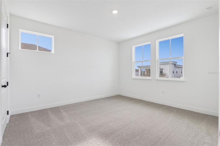 Spacious, unfurnished interior of a new home in Laureate Park (Craft Homes), Orlando (Image 27).