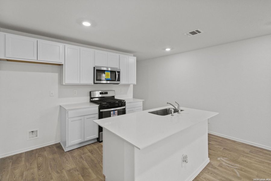Furnished interior view inside a new home in Hickory Ridge, Elmendorf (Image 10).