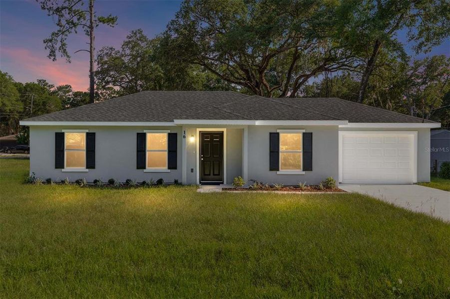 Front exterior of a new home in , Ocala, FL, highlighting curb appeal (Image 17).
