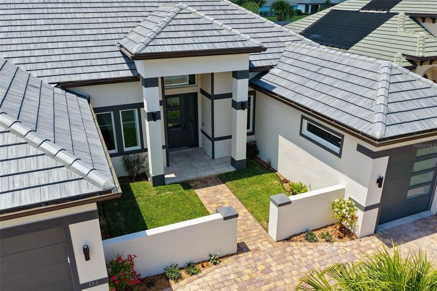Exterior details and patio area of a home in , Palm Coast (Image 33).