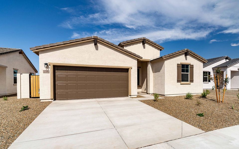 Front exterior of a new home in Rancho Santa Rosa, Maricopa, AZ, highlighting curb appeal (Image 2).