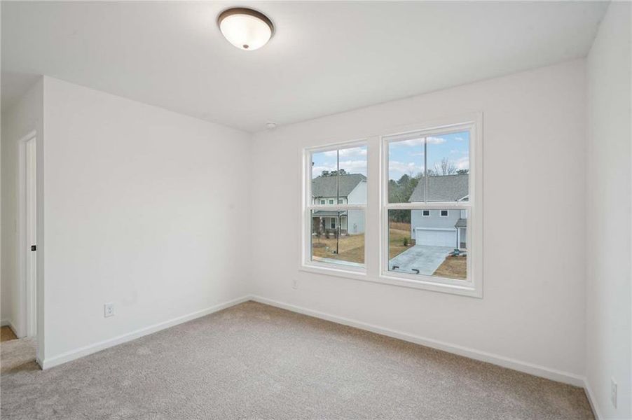 Spacious, unfurnished interior of a new home in Eastlyn Crossing, Flowery Branch (Image 23). Spacious, unfurnished interior of a new home in Eastlyn Crossing, Flowery Branch (Image 23).