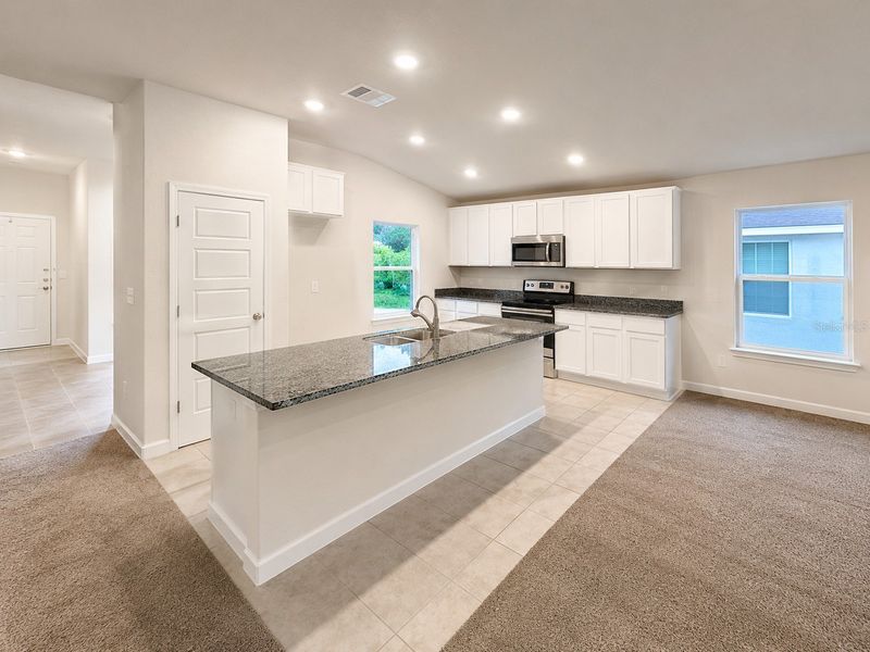 Furnished interior view inside a new home in Harmony Central, St. Cloud (Image 6).