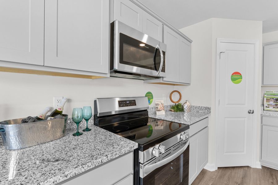 Representative furnished interior of a home built from the Spruce A by McGuinn Homes in Reserves at Mill Creek, Columbia (Image 12).