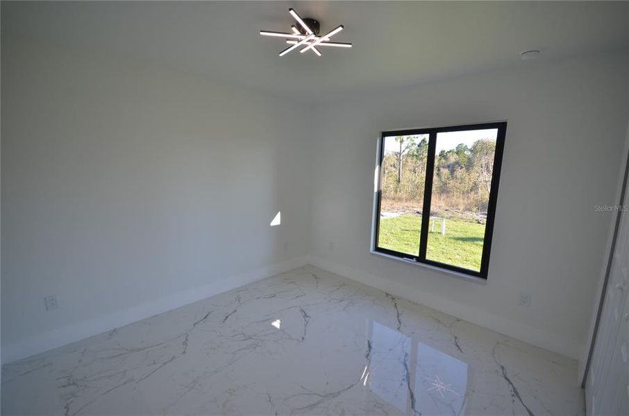 Spacious, unfurnished interior of a new home in , Lehigh Acres (Image 39).