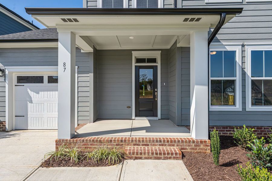 Exterior details and patio area of a home in Serenity - The Cottage Collection, Fuquay Varina (Image 4).