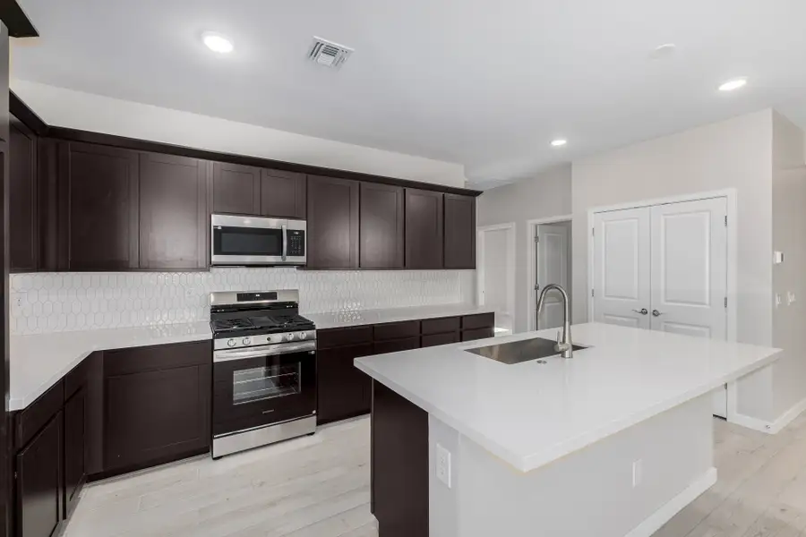 Furnished interior view inside a new home in Sunrise, Sun City West (Image 3).