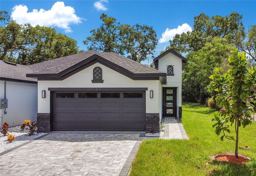 Front exterior of a new home in , Apopka, FL, highlighting curb appeal (Image 22).