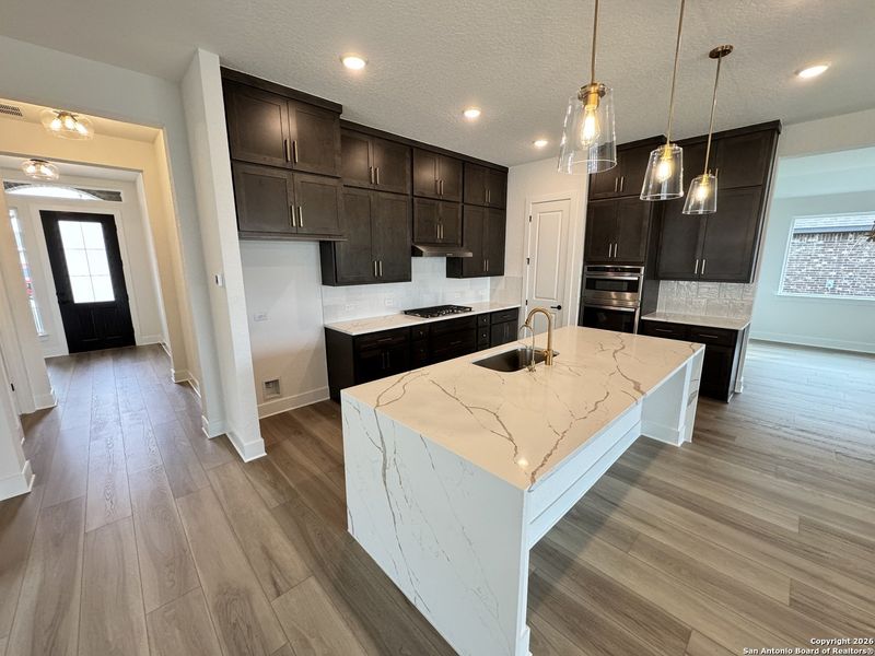 Furnished interior view inside a new home in Megan's Landing 70's, Castroville (Image 12).