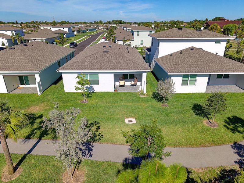 Front exterior of a new home in , Delray Beach, FL, highlighting curb appeal (Image 1). Front exterior of a new home in , Delray Beach, FL, highlighting curb appeal (Image 1).