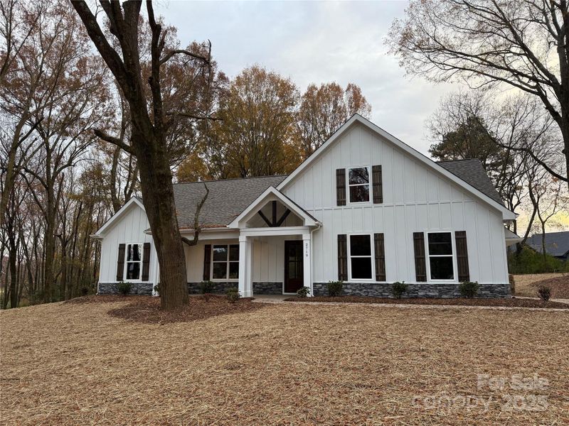 Front exterior of a new home in , Monroe, NC, highlighting curb appeal (Image 1). Front exterior of a new home in , Monroe, NC, highlighting curb appeal (Image 1).